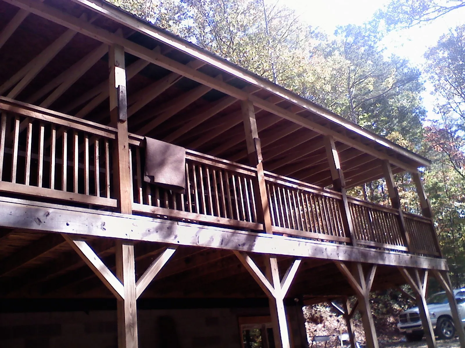 Timber framing under a new elevated porch and deck — Roof Leak Repair in South Hutchinson by Roofing Brothers